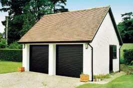 two single roller garage doors on detached garage